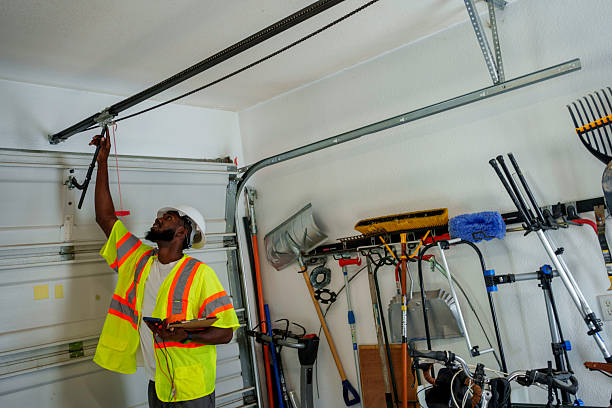 Professional Garage Door Roller Replacement technician working in Caldwell, OH